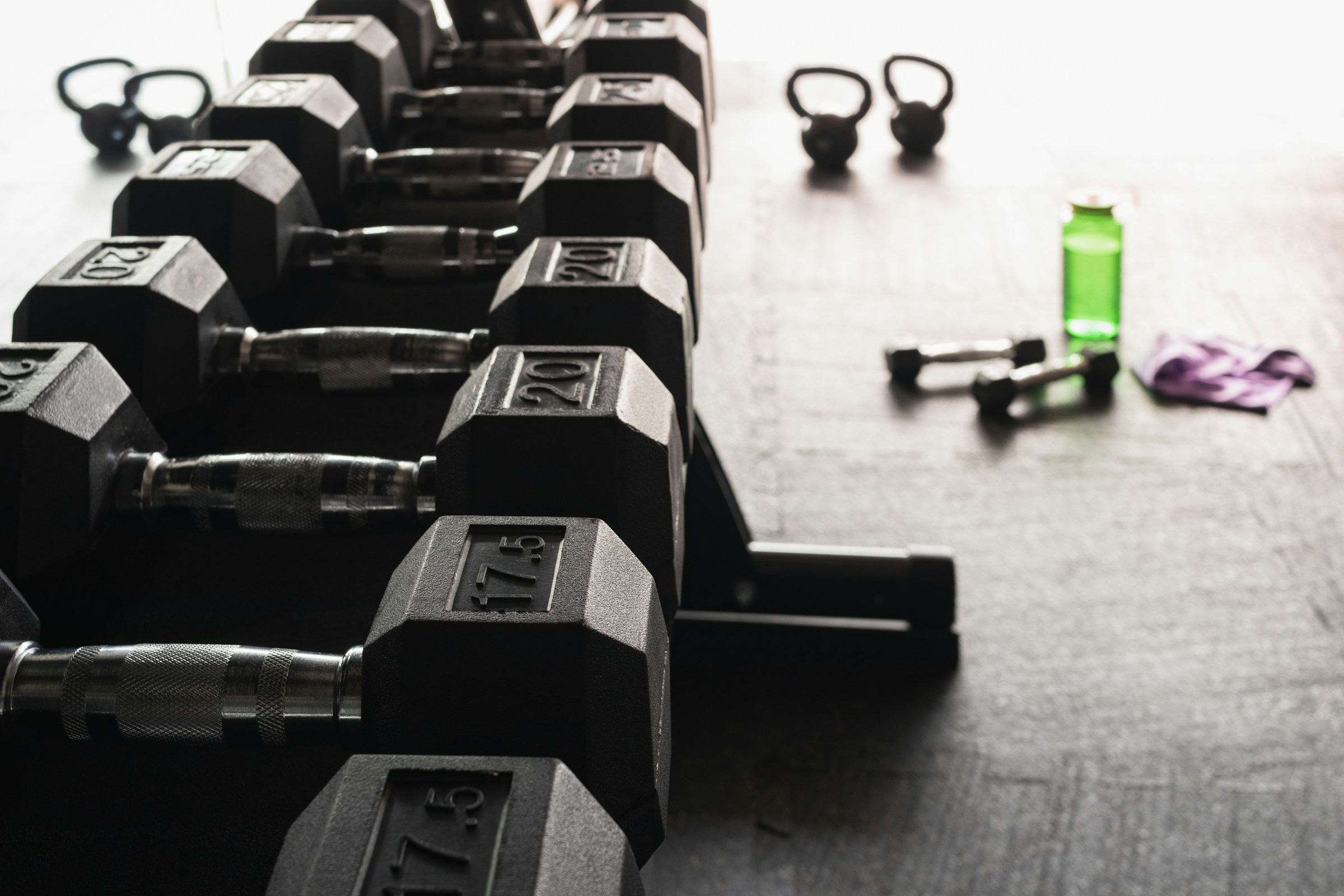 Dumbbells and training equipment in a fitness studio